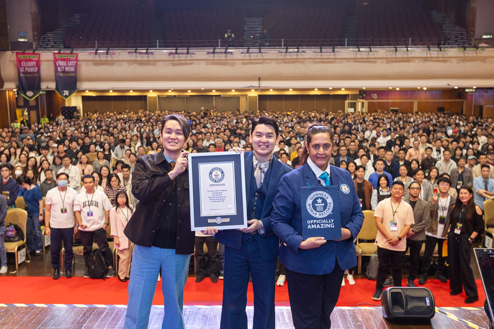 Jackson and Reeve Yew setting the Guinness World Record for the Largest AI Marketing Lesson