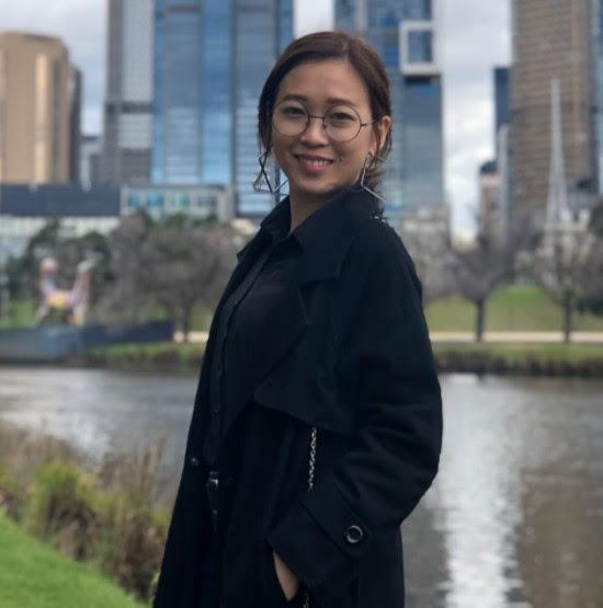 Portrait of Shanice Siew Huei in front of a city skyline